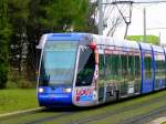 Montpellier, Tram Linie 1 La Mosson - Odysseum, Citadis 401 Alstom im Malbosc-Viertel kurz vor dem Rond-Point du Château d'Ô. Die 1. und 5. Wagen weisen auf die  OPEN SUD DE FRANCE  Turniere hin. 30.01.2014