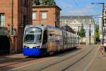 Ein Tram-Train von Thann zum Gare Centrale ist am 19.07.2015 zwischen den Haltestellen Porte Jeune und Republique unterwegs