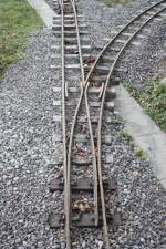Eine Weiche der Freiburger-Minidampfbahn und ein nachbau einer Originalen Feldbahnweiche. ...