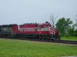 GP38 Wisconsin & Southern 752 and a lok marked WSOR roll near Prairie Du Chien, Wisconsin on 19 June 2002.