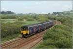 Der First Great Western 150 927 auf seiner Fahrt von Penzance nach Bristol Temple Meadas schwenkt kurz nach Long Rock ins Landesinnere. 
18. Mai 2014