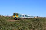 Der Class 313 208 unterwegs am 2. August 2018 als Southern Seaford - Brighton zwischen Newhaven Harbour und Bishopstone.
