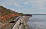 Von London kommend, erreicht ein GWR HST 125 Class 43 in Kürze den Halt Dawlish, wo der 07:30 GWR Service nach Paignton jedoch nicht halten wird. 19. April 2016