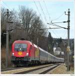 1116.064 mit dem OIC640, kurz nach Tullnerbach-Pressbaum; 28.2.2010.  ...