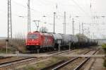 HGK Hafen - Und Guterverkehr Koln HGK 2067 (185 632-7) mit Kesselwagenzug nach Stendell am 09.04.2010 durch Passow