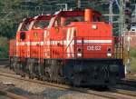 HGK Hafen - Und Guterverkehr Koln DE82 im Lokzug mit zwei Schwestermaschinen in K�ln-West am 30.07.2010