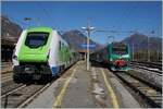 Ein Trennord ETR 421  Rock  nach Milano und die FS Trenitalia E 464 122 mit ihrem Regionalzug nach Novara warten in Domodossola auf die Abfahrt.

28. Okt. 2021