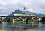 FS ALn668 1401 + ALn668 1452 painted with the historical livery, crossing the Adda river in Lecco on the 7th of June in 2008.