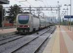 3.8.2010 10:27 FS Baureihe E.402 103 mit einem EurostarCity aus Roma Termini nach Genova Piazza Principe bei der Einfahrt in den Bahnhof Cecina.