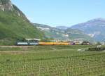 A class E412/E405 combination haul a southbound freight through the Brenner Pass pictured here near Ala, 29 April 2014