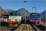 Erfreuliche bunte Trenitalia: Die im wunderschöenen neuen Farbkleid gehaltend FS E 464.603 erreicht mit ihrem Regionalzug von Novara kommend ihr Ziel Domodossola. Links im Bild ist die FS 656 431 zu sehen. 
26. Okt. 2016