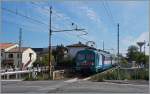 Der Ale 582-058 erreicht als  Regionale 6510  von Rimini nach Ravenna in Kürze den Bahnhof Cesenatico.