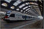 Ein ETR 524 der Trenord und ein RABe 524 der SBB warten als TILO RE 25170 in Milano Centrale auf die Abfahrt nach Castione Arbedo.