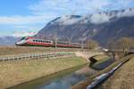 An ETR610 EMU passes Auer whilst working train 8517, 1316 Bolzano to Roma Termini, 7 Feb 2018