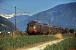 An einem sonnigen Märztag 1985 ist eine ALe 840-Garnitur zwischen Bolzano/Bozen und Merano/Meran unterwegs