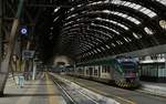 Ein ETR 425 der Trenord verlässt am 01.05.2019 Milano Centrale. Die Trenord ist ein Zusammenschluss der Regionaldirektion von Trenitalia und LeNord, der Personenverkehrstochter der Ferrovia-Nord Milano, der zweitgrößten Bahngesellschaft Italiens. 