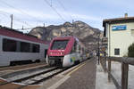 Ferrovia Trento-Malé-Mezzana, Zugkreuzung zweier Doppeltraktionen Alstom ETi 8/8 im Bahnhof Mezzocorona Ferrovia (dieser befindet sich in der Nähe des Bahnhofs Mezzocorona der Brennerbahn).