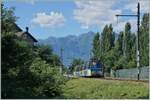 Der SSIF Treno Panoramico PE 47, bestehend aus dem Be 4/4 Pp 82  Toceno  (94 83 4440 082-5 I-SSIF) an der Spitze, einem Rimorchiata (Zwischenwagen), einem Be und dem ABe 4/4 Pp 83  Masera  (94 83 3440