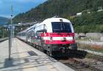 1216 020  175 Jahre Eisenbahn fr sterreich  ist am 19.07.2012 mit einem EC in Waidbruck / Ponte Gardena.