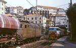 Im am 11.12.2016 stillgelegten Bahnhof Imperia Porto Maurizio (Strecke Ventimiglia - Genua) treffen sich im März 1987 die E 636 351 und die E 656 544