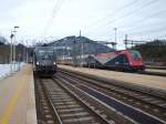 190.301 mit dem Rex 1880 und der D 13018 mit der 1116.153  im Bahnhof Tarvisio Boscoverde am 14.4.13 