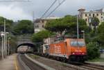 The E186.909 of Linea s.p.a. hauls an empty container train from Melzo Scalo to La Spezia Marittima, here in Zoagli.