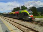 Ein ETR 170 als R 4897 (Fortezza/Franzensfeste - San Candido/Innichen) am 25.5.2015 bei der Einfahrt in den Bahnhof Dobbiaco/Toblach.