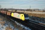 ITL Eisenbahngesellschaft mbH 189 203-3 im Dienst der ITL mit kommt mit leeren Kohlewagen aus Richtung Braunschweig gefahren. Fotografiert am 23.12.2009 in Magdeburg Diesdorf. 