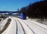 KIHA 283: Ein 9-Wagenzug (7+2 Wagen) unterwegs an der Kreuzungsstelle zwischen Atsunai und Urahoro im Südosten der Nordinsel Hokkaido.