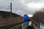 Intercity-zug Serie 283: Vor dem Schneesturm ist die Passlinie besonders düster.