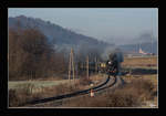 Die SZ Dampflok 33-037 fährt mit dem Weihnachtszug 15021 von Ljubljana nach Novo Mesto. 
Ivančna Gorica 17.12.2016