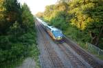 VIA-Schnellzug mit P42DC 910 am Abend des 10.8.2009 an der Snake in Richtung Westen.

