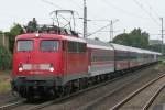 Die 110 452-0 zieht ...  Eric Otten 23.06.2011