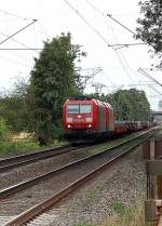 kbs-495-linke-rheinstrecke-kleve-koln Am Samstag den 17.7.2010 fuhren 185 175-7 und 185 004-9 mit einem Schwerlastwagenzug von Neuss kommend in Richtung Krefeld. Hier sind sie kurz vor Tilmeshof.