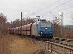 kohle--erz--und-kokszuge Schwere Last am Haken hat am 27.02.10 die 185 530-3 der VPS, die hier mit einem Erzleerpark durch Hamburg-Moorburg zum Hansaport im hamburger Hafen f�hrt.