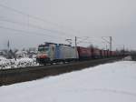 Lokomotion Die 186 107 am 16.01.2010 mit dem Winner KLV-Zug unterwegs bei Osterm�nchen. 