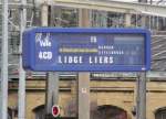 FEHLERTEUFEL! Zugzielanzeiger auf einem Bahnsteig im Bahnhof von Luxemburg der einiges Kopfzerbrechen bereitet: Lidge? anstatt Lige und von der Abfahrtszeit ist nur die Minutenzahl ersichtlich!