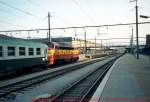 CFL - Luxemburg - Die Lok ist die GM 1604 die, in July 1994, ist noch nicht eine Museumslok geworden. Hier sehen Sie auch diesen SNCF Zug Kln - Port Bou.
Foto : J.J. Barbieux