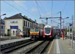 Der Triebzug 2008 und ein Wendezug mit dem Steuerwagen 018 stehen am 09.10.2010 im Grenzbahnhof von Rodange.