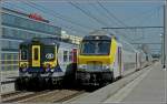 M 6 Begegnung auf der Hochgeschwindigkeitsstrecke L 4 zwischen der AM City Rail 988 und einer 'composition dromadaire', bestehend aus M 6 Wagen und einer HLE 13 in der Mitte, am 23.06.10 im Bahnhof Antwerpen Luchtbal. (Jeanny)