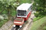 Ein KBB-Wagen der zweiten Generation mit Vorstellwagen fr groes Gepck am 11.Mai 2009 kurz vor der Bergstation.