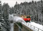 mariazellerbahn-st-polten---mariazell �ber die 110m lange Kuhgraben Br�cke, f�hrt die 1099 008 mit dem R 6813 von St.P�lten nach Mariazell. 
Erlaufklause 31.01.2010