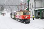 mariazellerbahn-st-polten---mariazell 1099 004 mit R 6804 beim Halt im Bahnhof Laubenbachm�hle.
31.01.2010