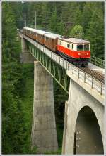 mariazellerbahn-st-polten---mariazell 1099.02 f�hrt mit dem R 6811 �ber die Kuhgraben Br�cke.
Erlaufklause 4.7.2010