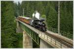 mariazellerbahn-st-polten---mariazell Dampflok MH 6 f�hrt mit Panoramic 760  von Ober Grafendorf nach Mariazell. 
Kuhgraben Br�cke Erlaufklause 4.7.2010