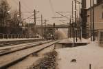 120 203 bei der Einfahrt mit RE1 in den Bf. ...