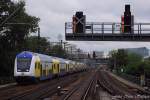 Metronom Eisenbahngesellschaft mbH Mittlerweile auch ein fast schon gewohnter Anblick in Berlin,die Sonderfahrten des erfolgreichen Metronoms in die Bundeshauptstadt.
Hier hat der Sonderzug aus Rotenburg soeben den Bahnhof Berlin Zoo verlassen,um seinem Endbahnhof Berlin-Ostbahnhof zuzustreben,S-Bhf. Tiergarten (05.09.2009)