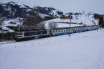MOB Montreux - Berner Oberland - Bahn GDe 4/4 6001 f�hrt am 16.1.10 mit einem Regionalzug von Gruben Richtung Gstaad.