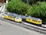 Gartenanlage der Stockerenbahn in Bolligen/BE .. Zwei Zge unterwegs am 11.08.2013