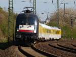 mrce-mitsui-rail-capital-europe �berraschung! Der Taurus ES 64 U2 032 von MRCE zieht am 23.04.2010 einen Messzug aus Richtung Herzogenrath kommend weiter nach Aachen West. Der TF scheint Sinn f�r Humor zu haben, auf dem Nummernschild das hinter die Frontscheibe geklebt ist steht 'TESTFAHRT'. Im Hintergrund kann man die Kirche von Laurensberg St.Laurentius erkennen.